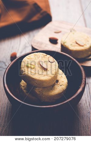 Stock photo of Soan Papdi or Soan roll or Patisa or patisha, popular sweet from India. selective focus