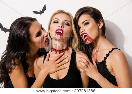 Anger, Rage, Death, Hunger And Thirst. Close Up Of Three Diabolic Mysterious And Paranormal Mistress