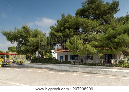 CHALKIDIKI, CENTRAL MACEDONIA, GREECE - AUGUST 25, 2014:  Panoramic view of port of Nikiti at Sithonia peninsula, Chalkidiki, Central Macedonia, Greece