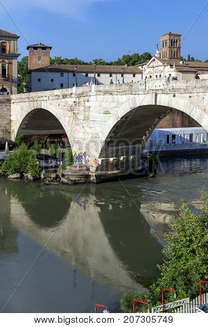 ROME, ITALY - JUNE 22, 2017: Amazing view of Tiber River and Pons Cestius in city of Rome, Italy