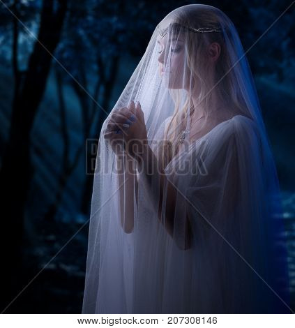 Young elven girl at forest