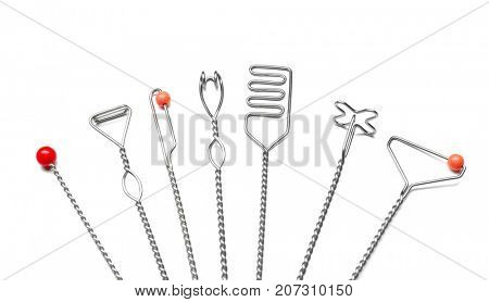 Set of instruments for speech therapist on white background