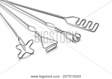 Set of instruments for speech therapist on white background