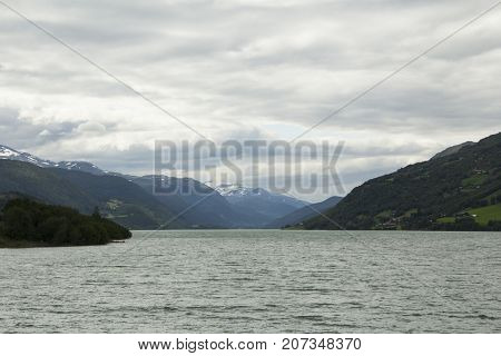 View Of A Lake With Mountain In Background