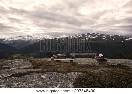 A Bench In Norwegian Mountains Jotunheimen At Summer Evening