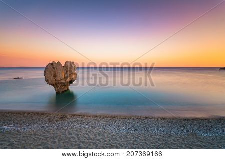 Lonely rock sculpture at the shape of heart, Preveli, Crete, Greece