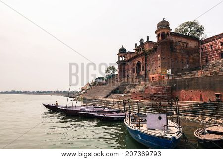 VARANASI INDIA - MARCH 14 2016: Horizontal picture of the amazing architecture of Chet Singh Ghat in front of Ganges River in the city of Varanasi in India