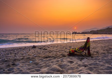 Tropical sandy beach of Ligres, Crete, Greece, with big waves.