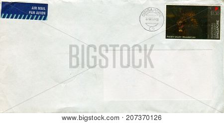 GOMEL, BELARUS - AUGUST 12, 2017: Old envelope which was dispatched from Singapore to Gomel, Belarus, August 12, 2017. 