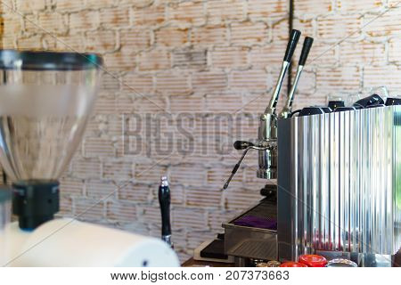 coffee maker machine pressure type with lever or controlling handle.