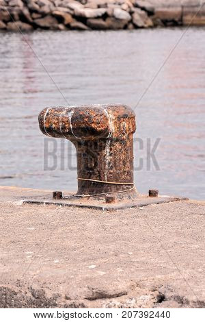 Rusty Metal Mooring Bolard For Big Ship