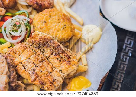 Big Set Greek Food Meat Plate With Potatoes And Sauce