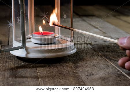 Two Small Lanterns On A Wooden Table. Candle In Old Latarence. Wooden Table.