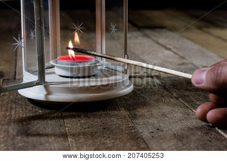 Two Small Lanterns On A Wooden Table. Candle In Old Latarence. Wooden Table.