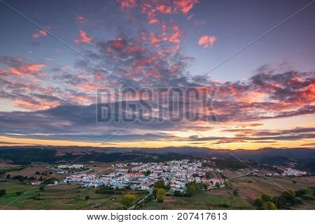 Magical sunrise over the village of Aljezur. Portugal