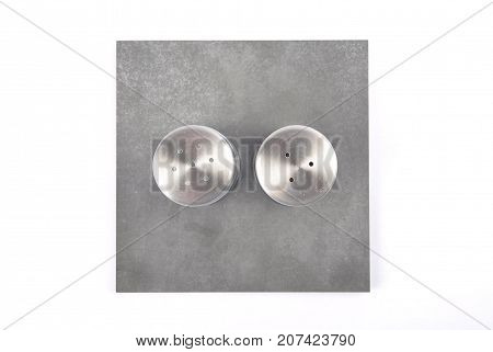 Colorful and crisp image of saltshaker and pepper caster