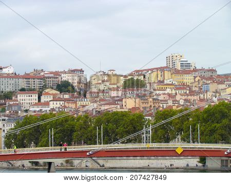 Cityscape view on top hill La Croix-Rousse ginger cross neighborhood of Lyon France with colorful houses and buildings