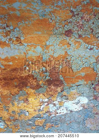 Corroded metal background. Rusted white painted metal wall. Rusty metal background with streaks of rust. Rust stains. The metal surface rusted spots. Rystycorrosion.
