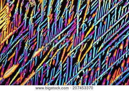 colorful microscopic shot of Sodium nitrate microcrystals in polarized light