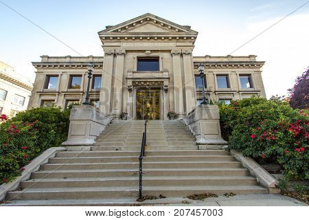 Manistee, Michigan, USA - October 1, 2017: The front entrance of the historical Manistee Public Library in downtown Manistee, Michigan.