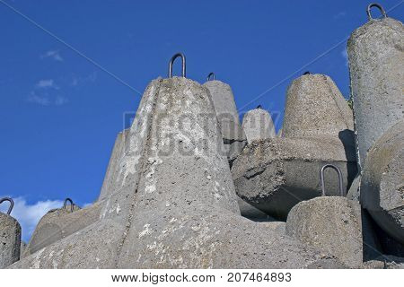 The Dam Is Made Of Concrete Blocks, Tetrapods Protects The City From The Large Waves Of The River