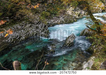 Nature autumn landscape. Waterfall at Soteska Vintgar Slovenia. The Vintgar Gorge or Bled Gorge.