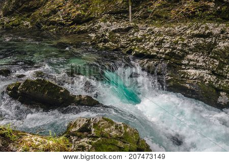 Nature autumn landscape. Waterfall at Soteska Vintgar Slovenia. The Vintgar Gorge or Bled Gorge.