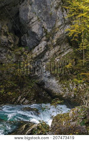 Nature autumn landscape. Waterfall at Soteska Vintgar Slovenia. The Vintgar Gorge or Bled Gorge.