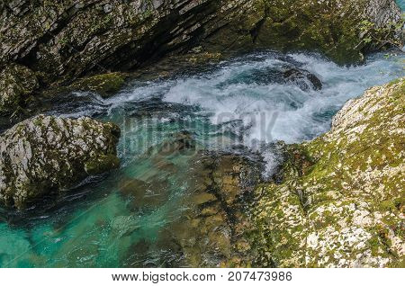 Nature autumn landscape. Waterfall at Soteska Vintgar Slovenia. The Vintgar Gorge or Bled Gorge.