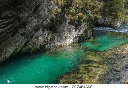 Nature autumn landscape. Waterfall at Soteska Vintgar Slovenia. The Vintgar Gorge or Bled Gorge.