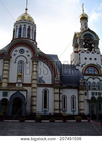 Beautiful colorful Christian Church stands on a hill