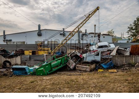 Scrap car recycling yard. Utilizing of old cars