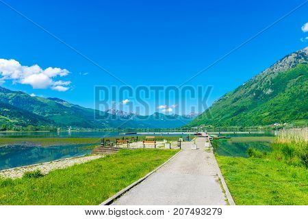A Large Pacifying Mountain Lake In A Picturesque Valley.