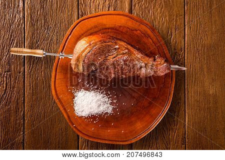 Alcatra traditional Brazilian barbecue. wooden in background