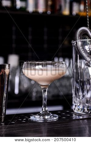 Baileys liqueur in glass on dark background. bar alcohol cocktail menu Milk liqueur. evening club concept
