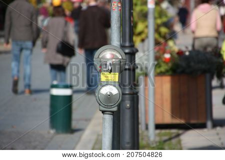Old parking meter in Germany standing on street