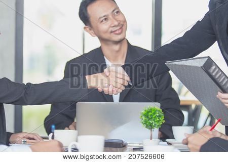 Teamwork Shake Hands Partnership Concept.team corporate discussion at workplace
