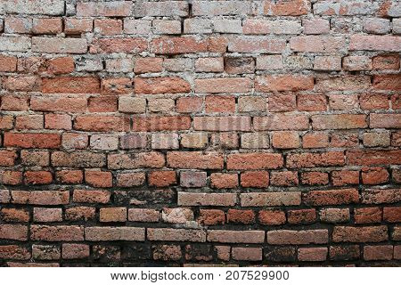Old brick wall in decoration architecture for the design background.