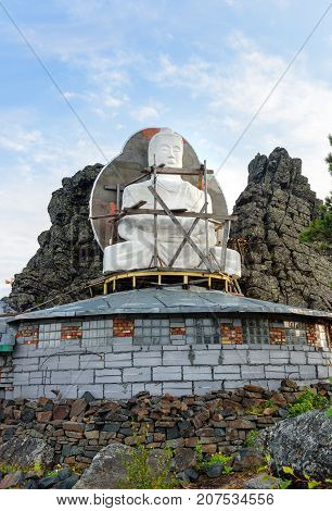 Seated Buddha In Shad Tchup Ling Buddhist Monastery On Mountain Kachkanar. Russia