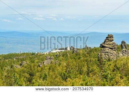 Rocks And Shad Tchup Ling Buddhist Monastery On Mountain Kachkanar. The Urals. Russia
