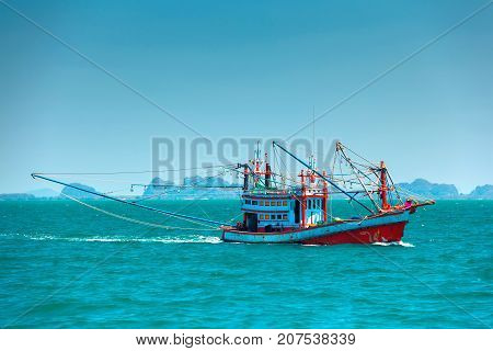 Fishing boat in the open sea. Krabi, Thailand.