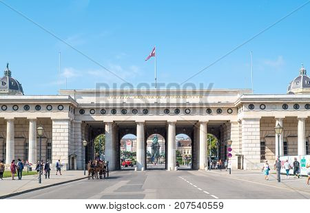 Vienna Austria - August 6 2016: Tourists near the monumental gateway to Helden square