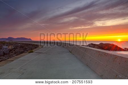On the pier in Laukvik at sunset Lofoten islands Nordland Norway. HDR image