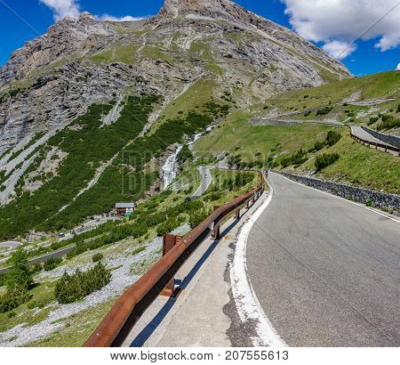 wide angle view of serpentine road in Stelvio Pass. Bormio side