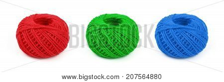 Three Multicolor Twine Bobbins Isolated On White