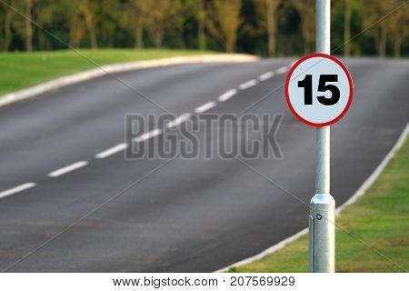Fifteen mile per hour speed limit on new road to service holiday campsite.