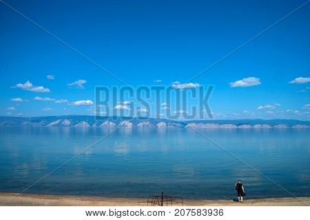 Girl On The Lake Baikal Shoreline