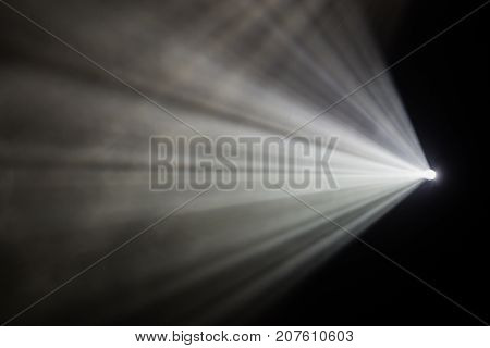 Rays theatrical spotlights on the stage during the performance. Lighting equipment. The lighting designer. Theatre arts
