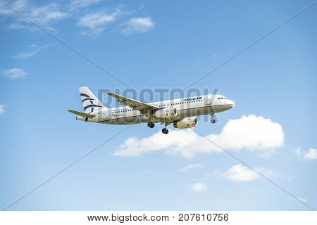 DUESSELDORF , GERMANY - OCTOBER 05 2017: Aegan Airline Airbus A320 landing at Dusseldorf Airport