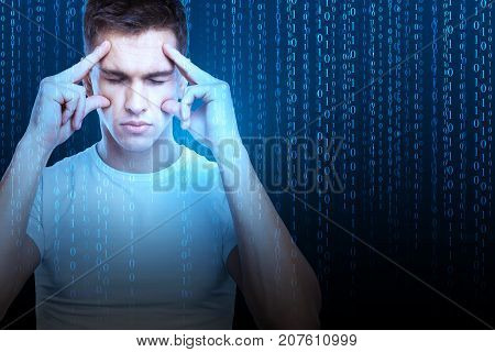 Pensive young businessman on abstract blue background with binary code stream. Computing concept. Double exposure
